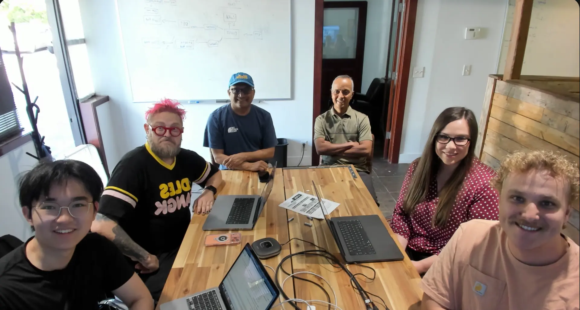 Plainsight team in a working session around the table